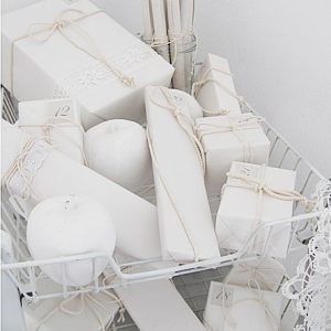 Gifts wrapped in white paper